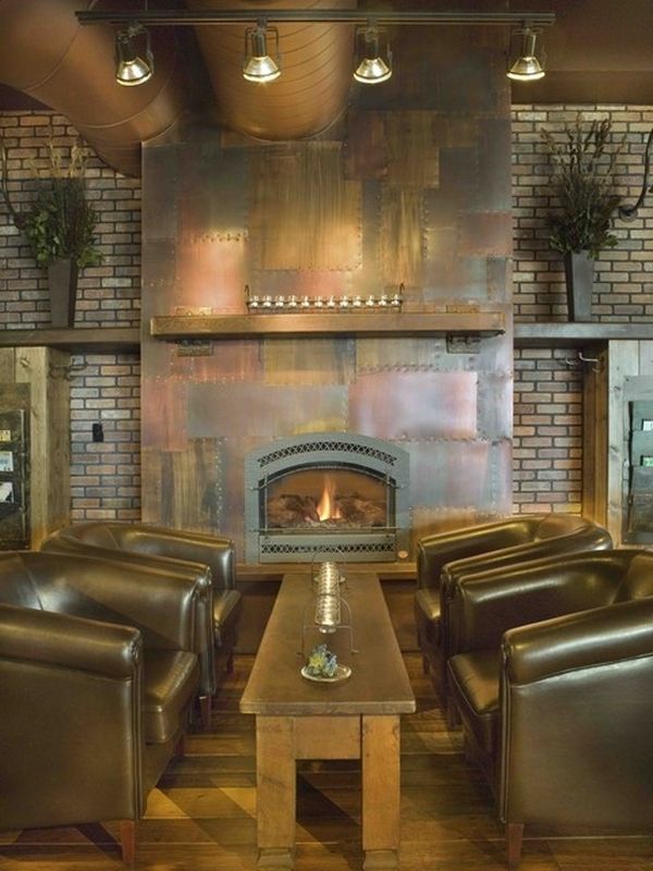 Exposed bricks steampunk decor fireplace metalic wall