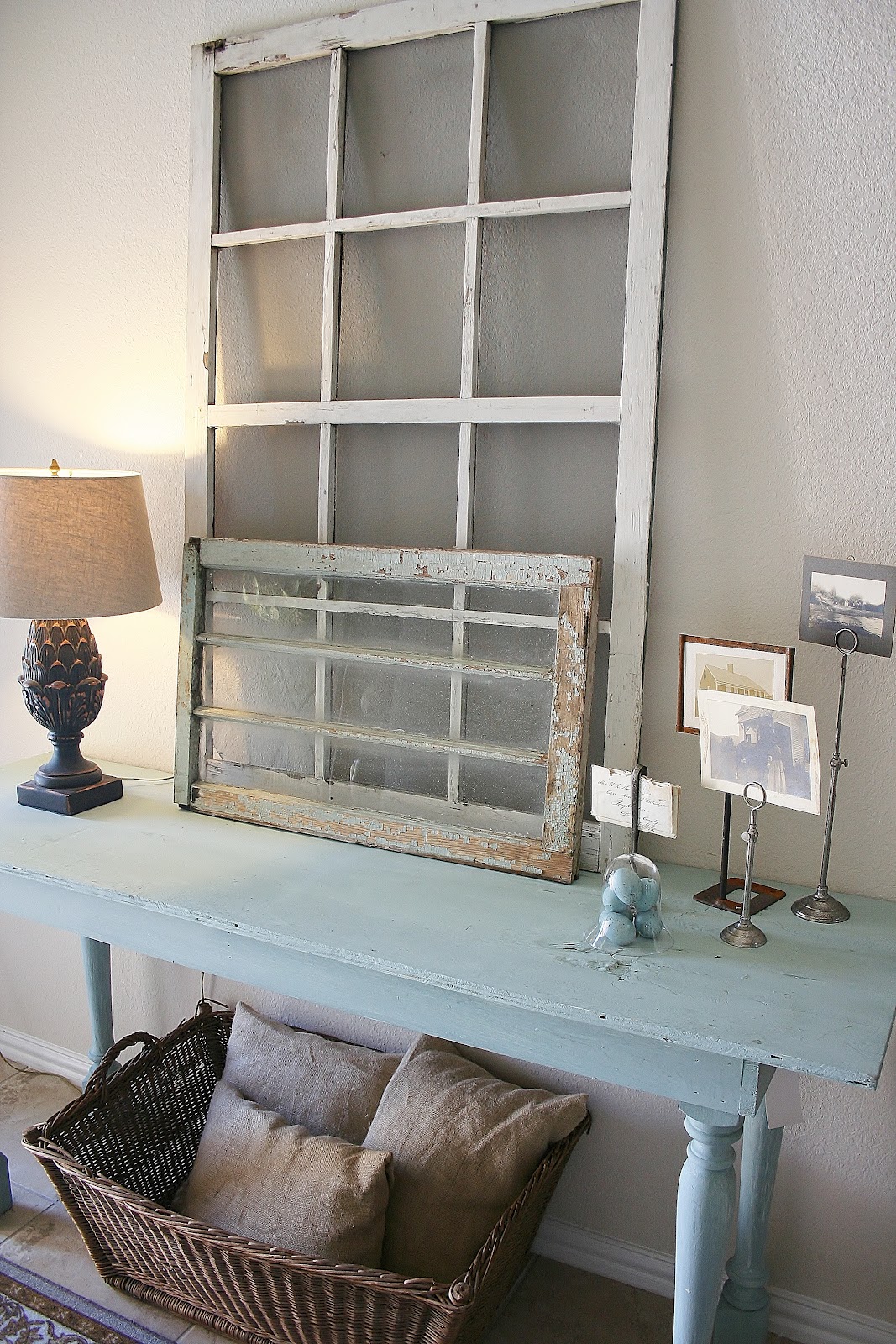 Entryway display old framed windows