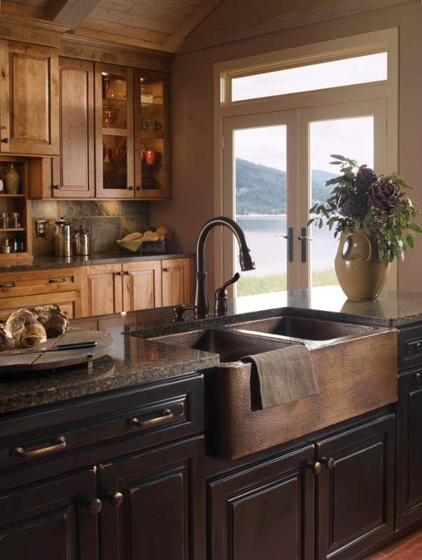 Kitchen island with copper farm sink