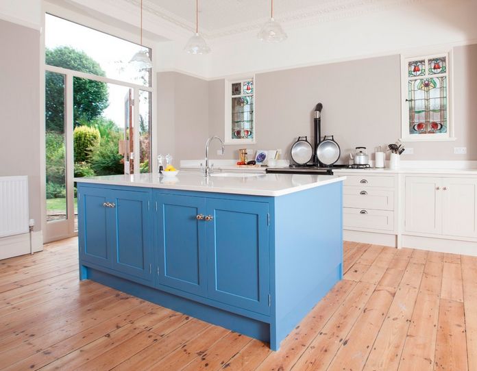 Unique hardwood floor with a blue island