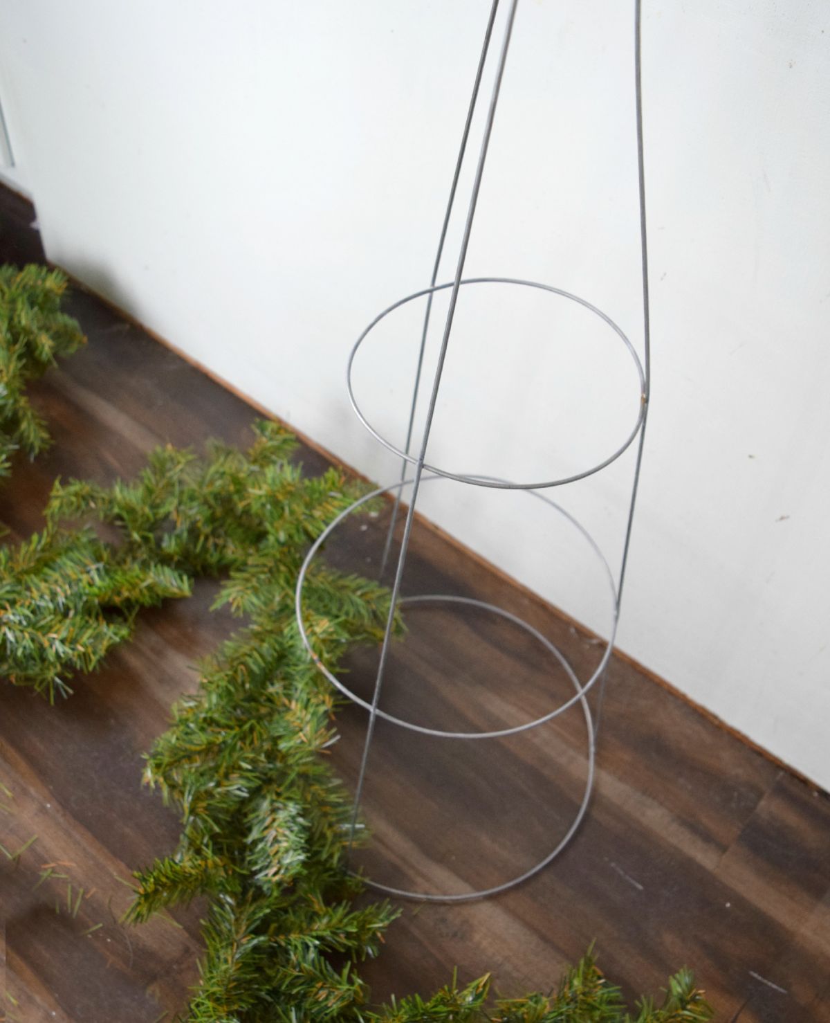 Winding garland around cage