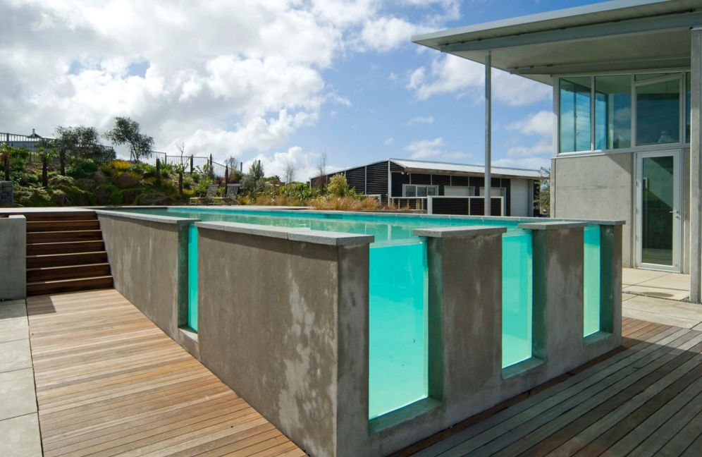 Concrete Swimming Pool With Glass Windows