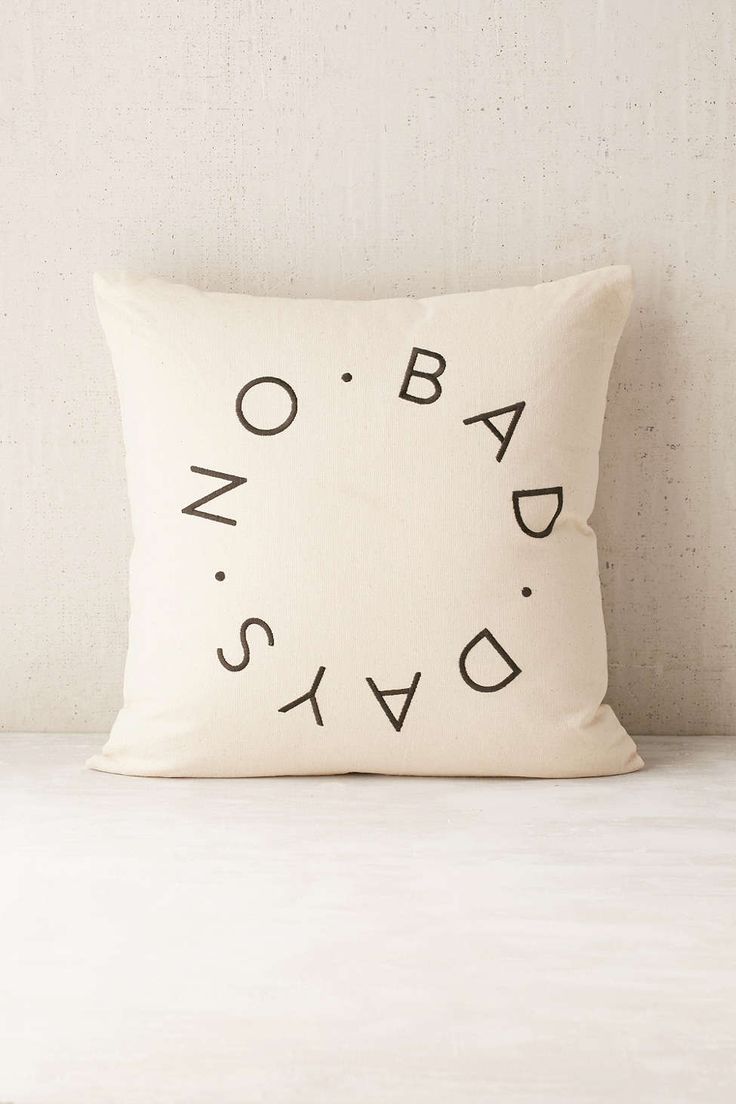 Motto throw pillow