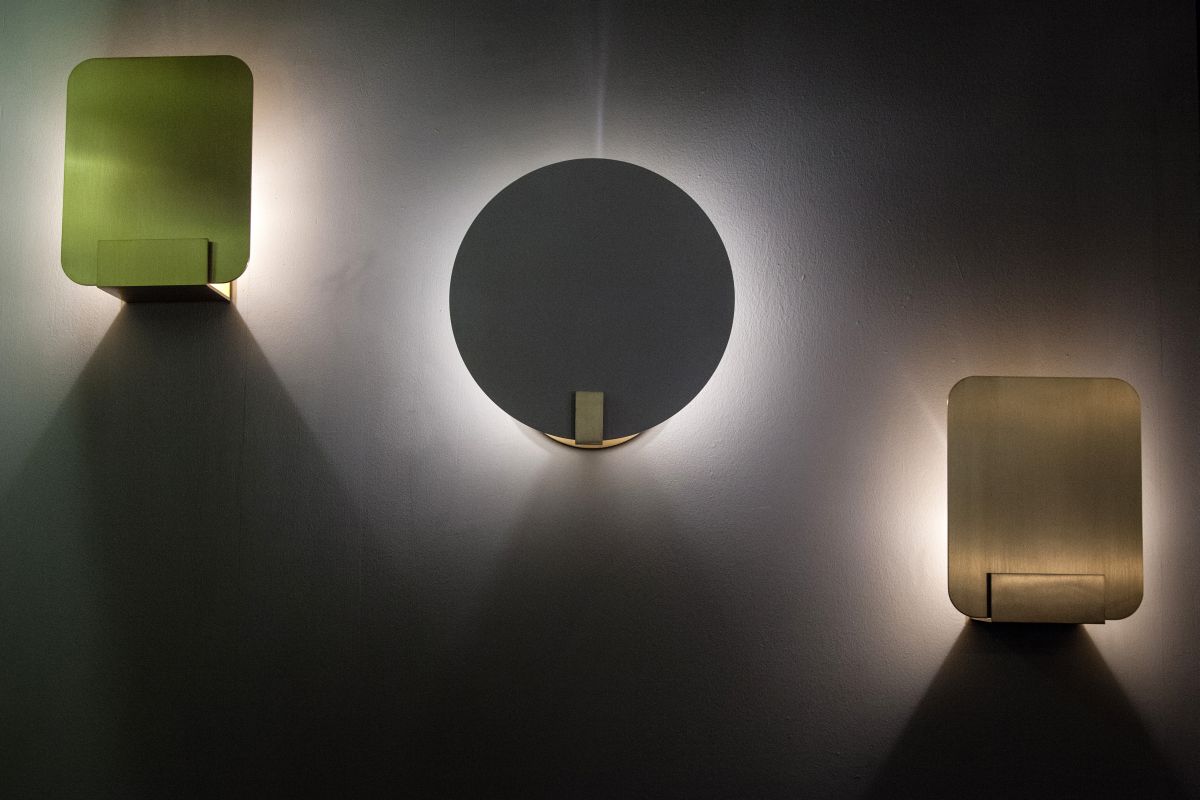 Geometric and spare yet dramatic, these wall lights from Art et Floritude cast a soft and sexy mood light.