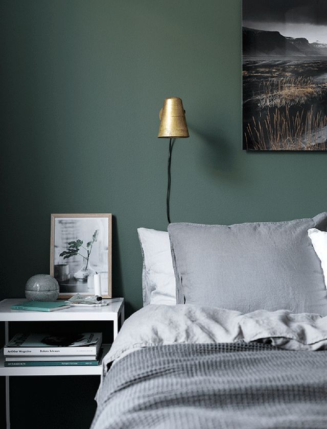 Moody green bedroom