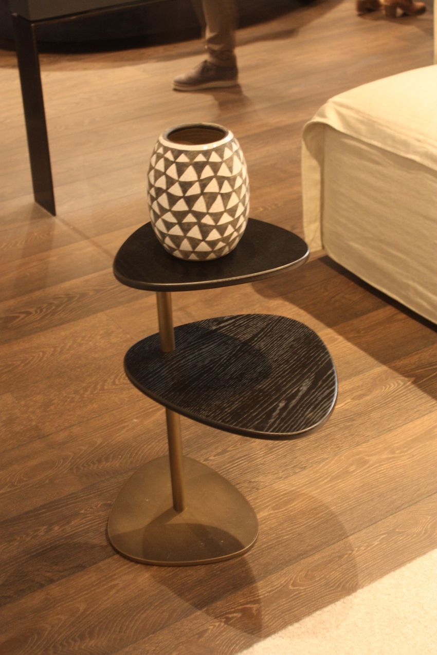 The top to levels of this slight but very interesting table from Euromobil almost seem to float when the base blends in with the flooring. It's perfect for spaces large and small.