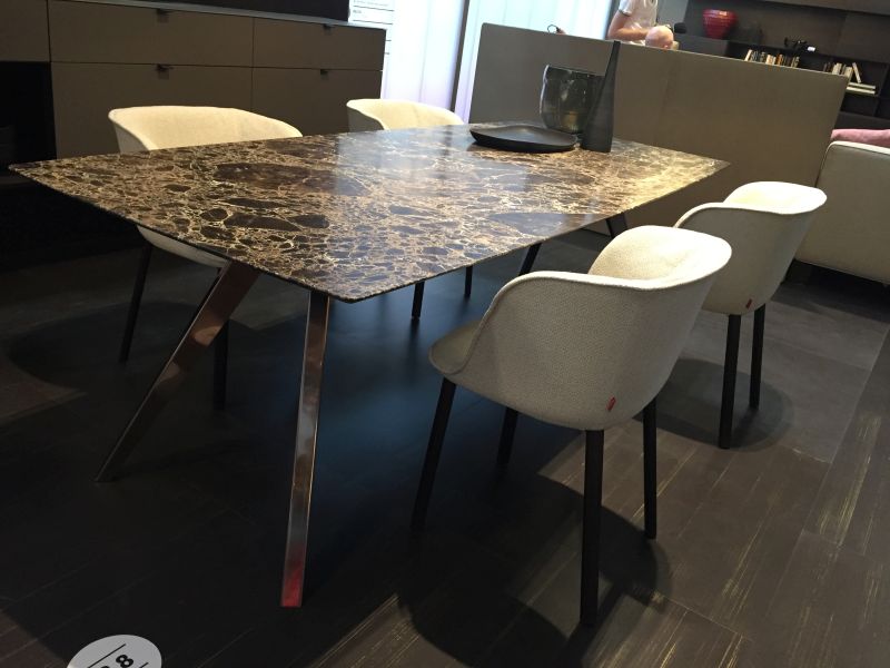 Marble rectangular dining table with white chairs