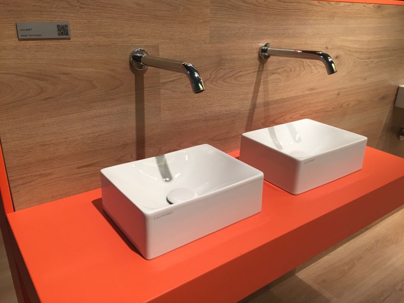 Orange double vanity with small wash basin