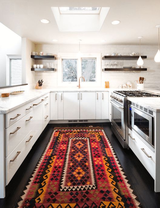 Funky kitchen floor with a traditional carpet