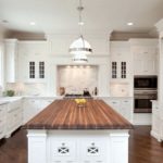 Futuristic kitchen design with laminate floor