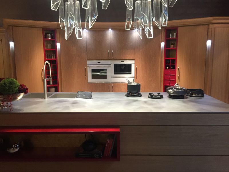 Add a touch of color with open space bookshelves in kitchen