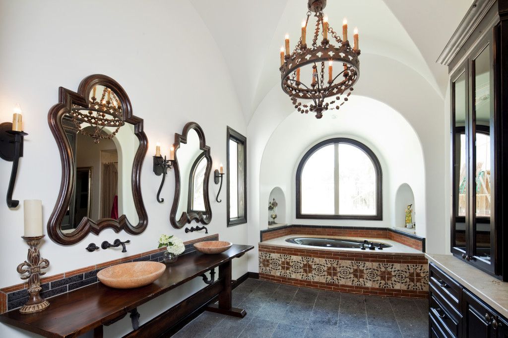 Chandelier and amazing mirrors for bathroom