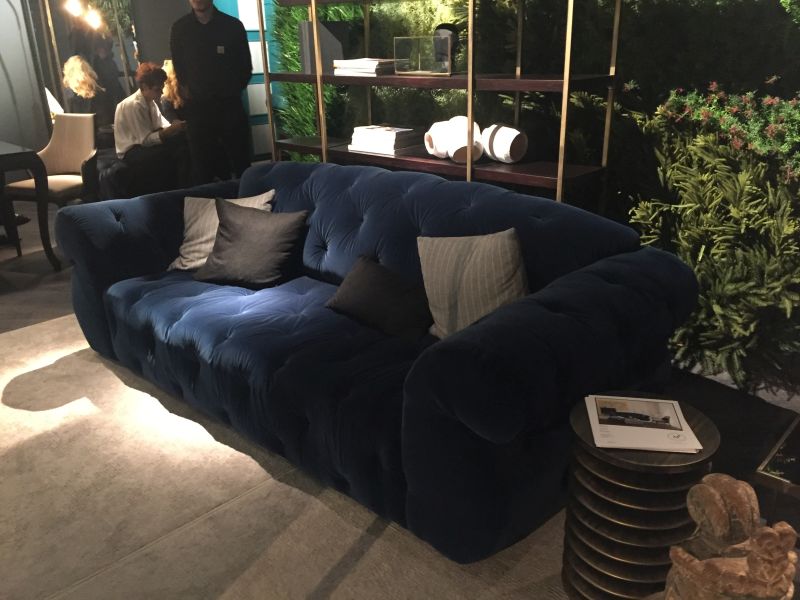 Generous tufted blue couch