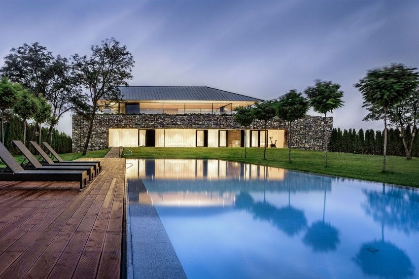 IO architects house with rocks facade and swimming pool