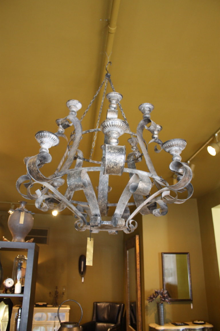 A bit medieval feeling, this substantial chandelier would be at home over a sturdy wood table or in an elegant country home foyer.