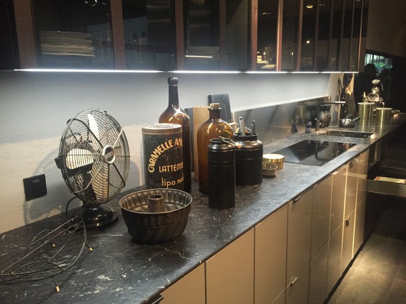 Drama And Elegance Reflected In A Black Kitchen Countertop