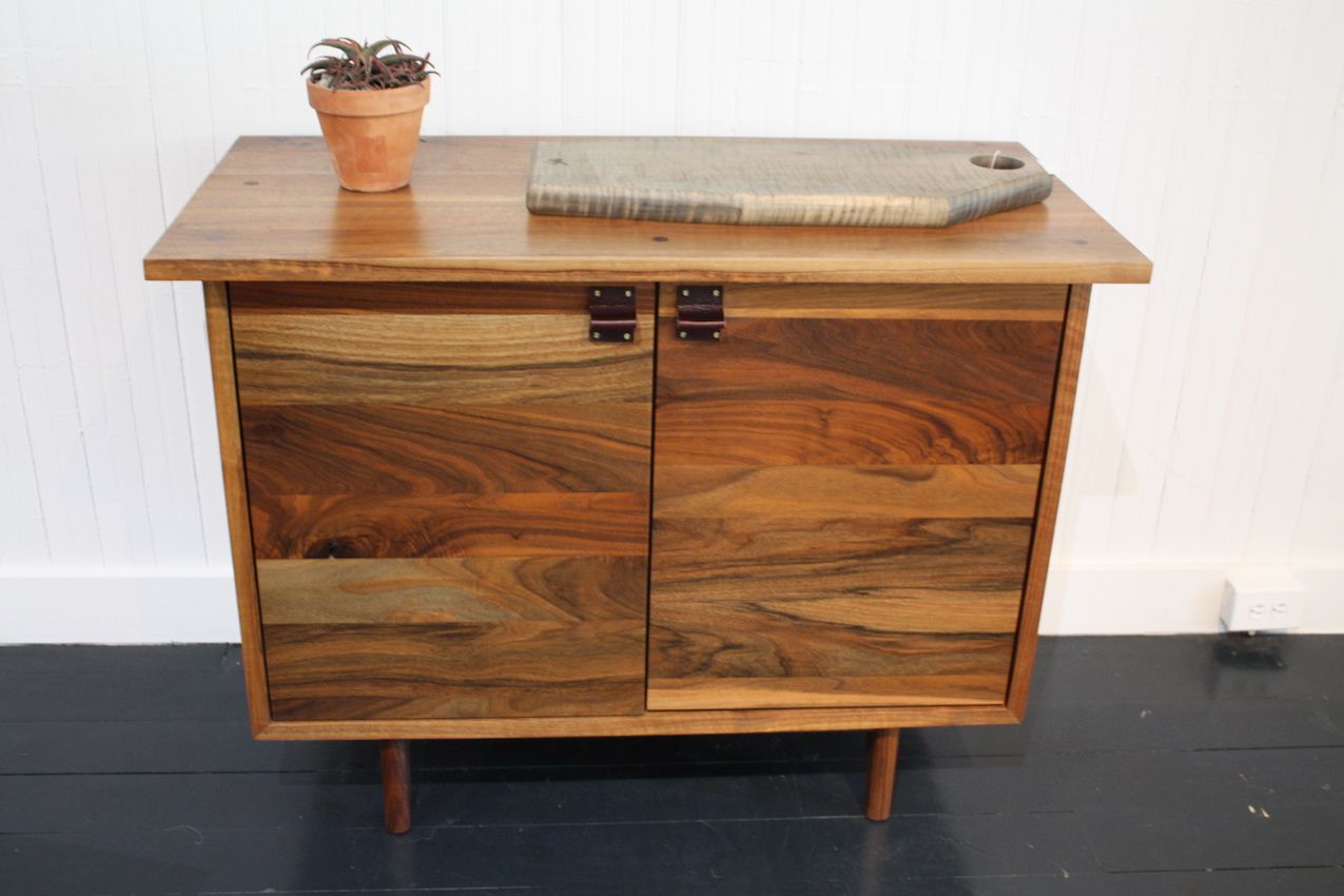 This is the Spring Bureau, which you can have with leather or turned hardwood pulls, and a walnut interior.