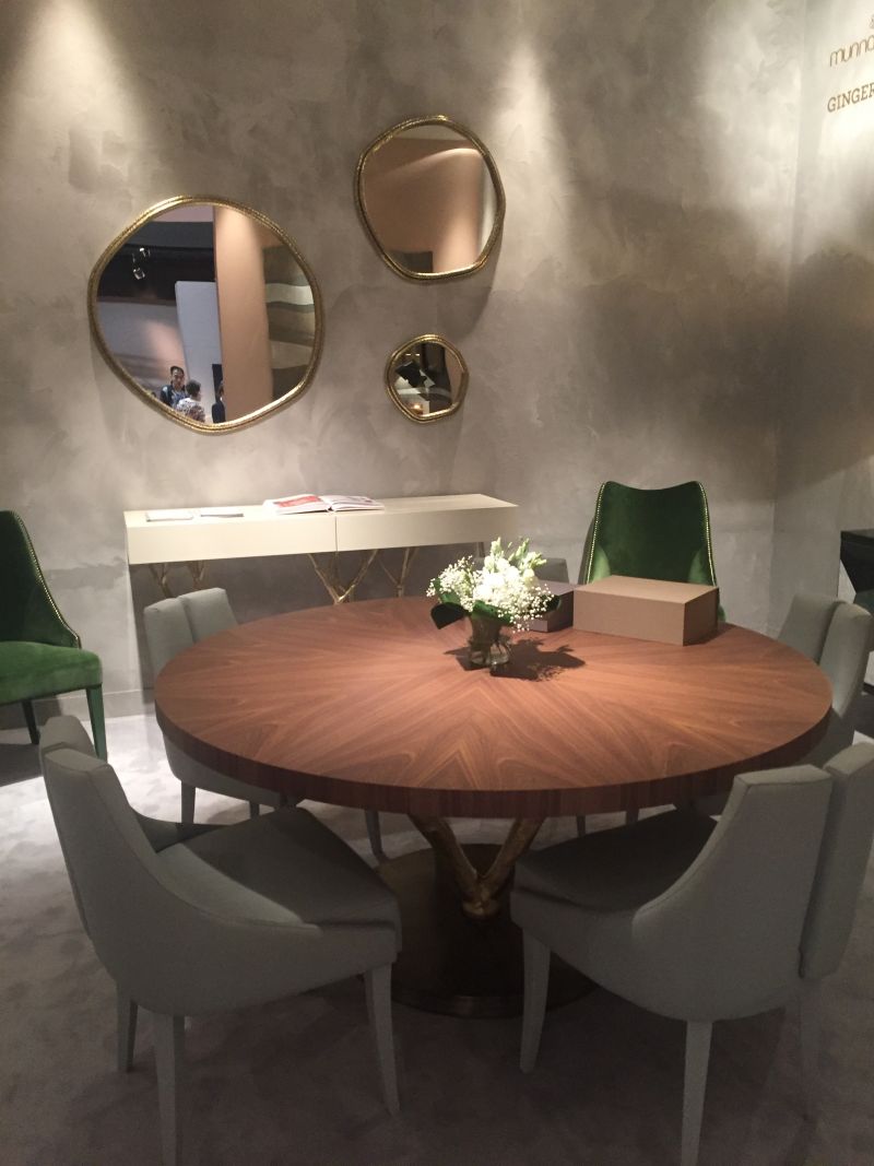 Round solid dining table top with a gold branch base