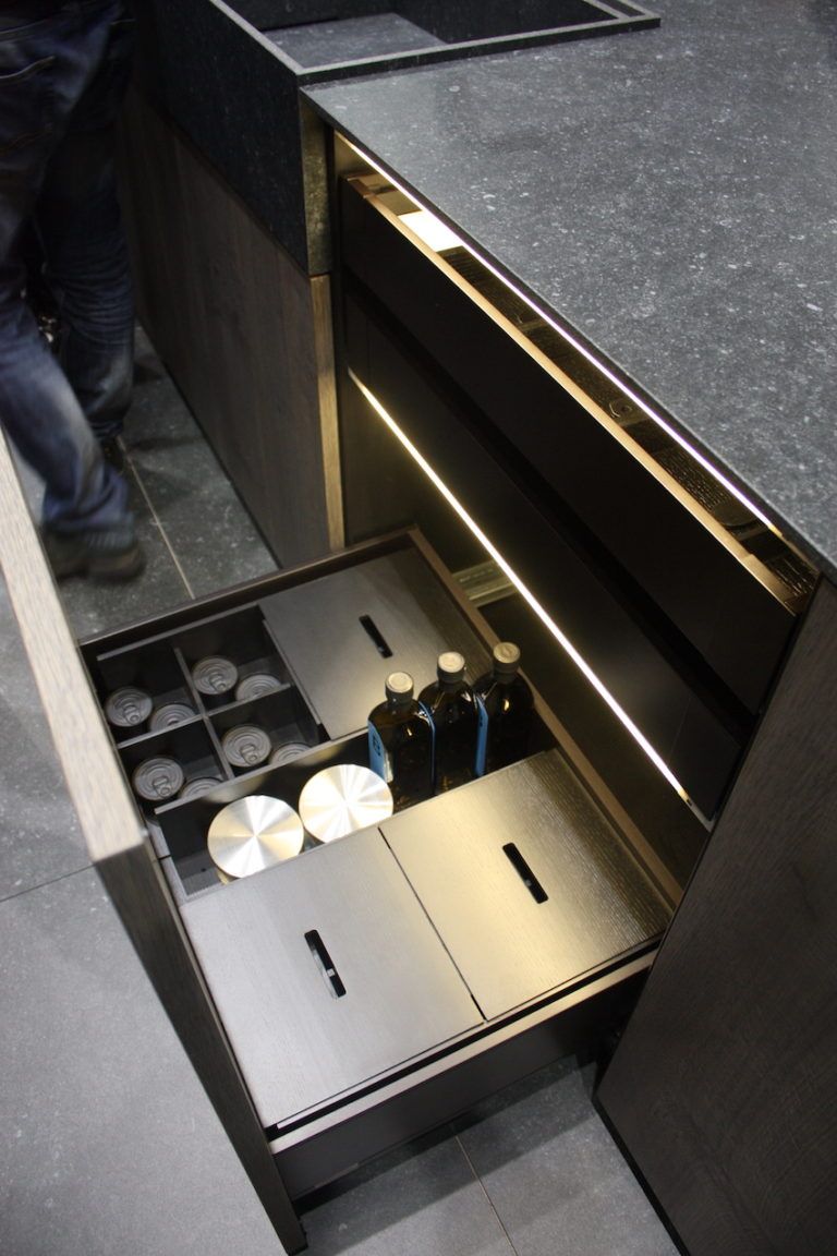 Compartmentalized and lighted drawers make organization a breeze.