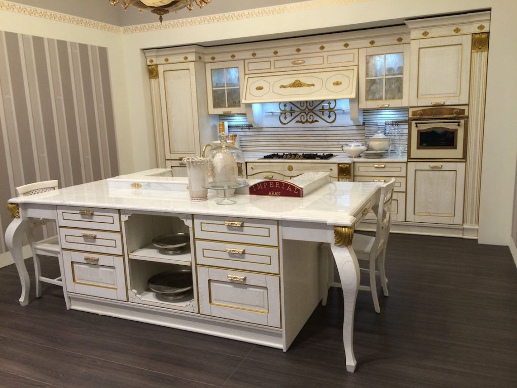 Traditional looks like this French provincial style can still incorporate the latest kitchen technologies and conveniences.