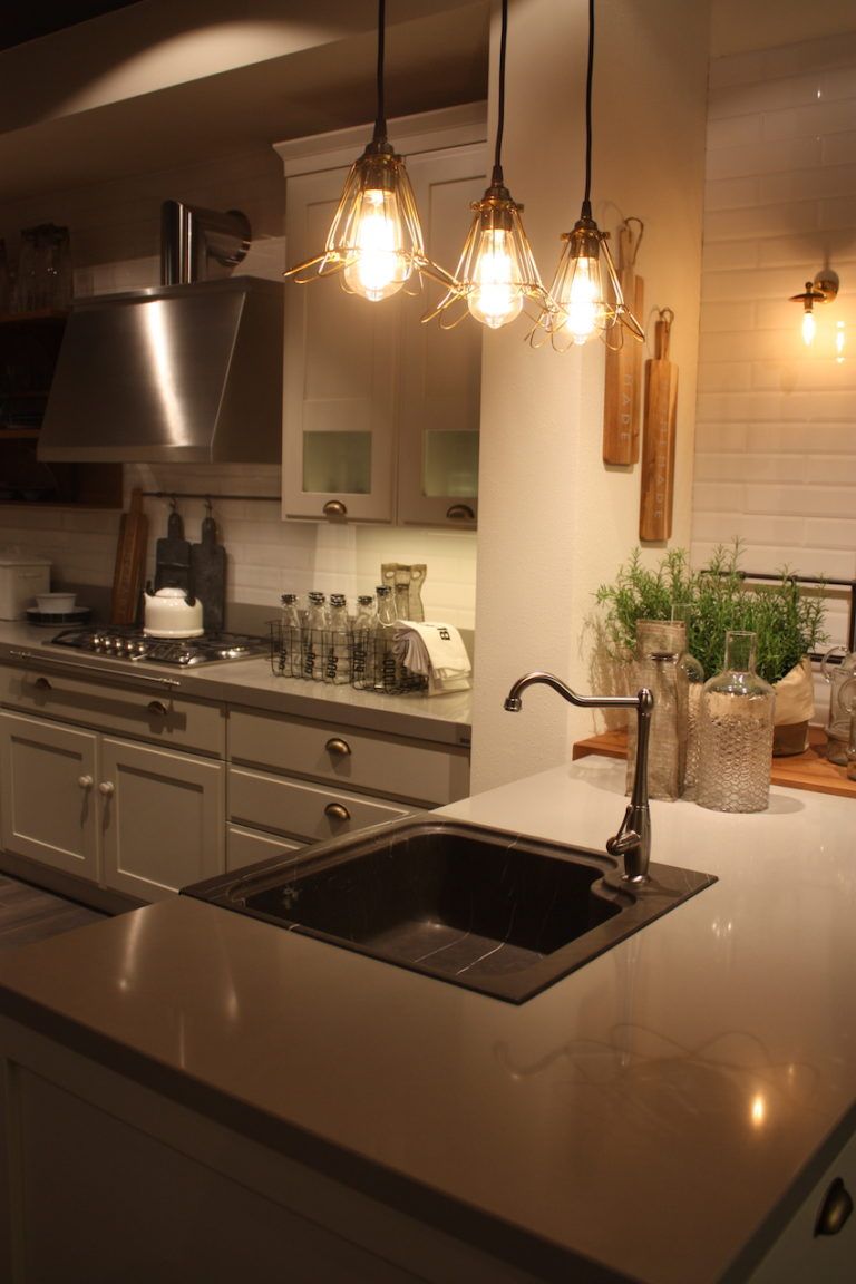 Scavolini's single compartment sink has a unique corner-mounted faucet.