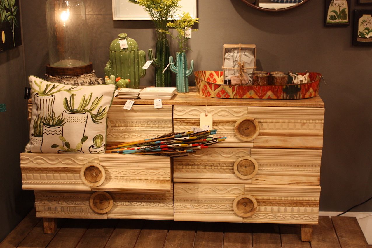 Light wood and short legs keep this credenza from being too heavy.