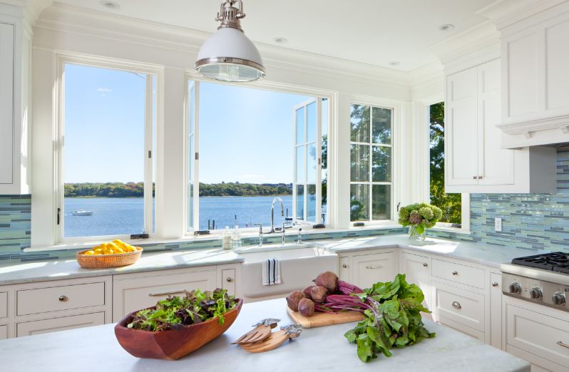 Open space kitchen with a letterbox window above countertop