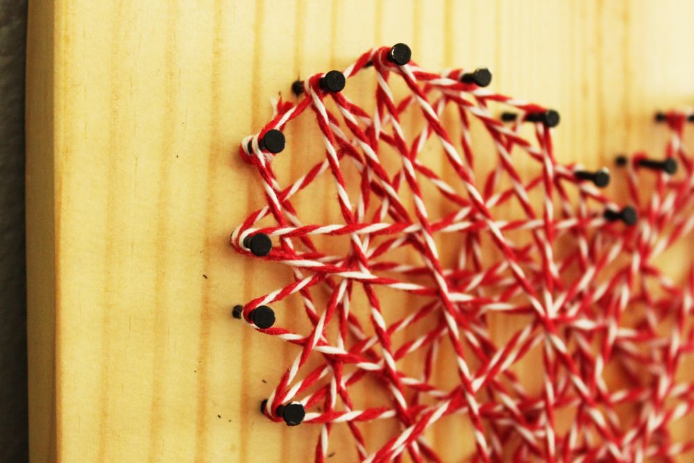 DIY Heart String Art with red and white string