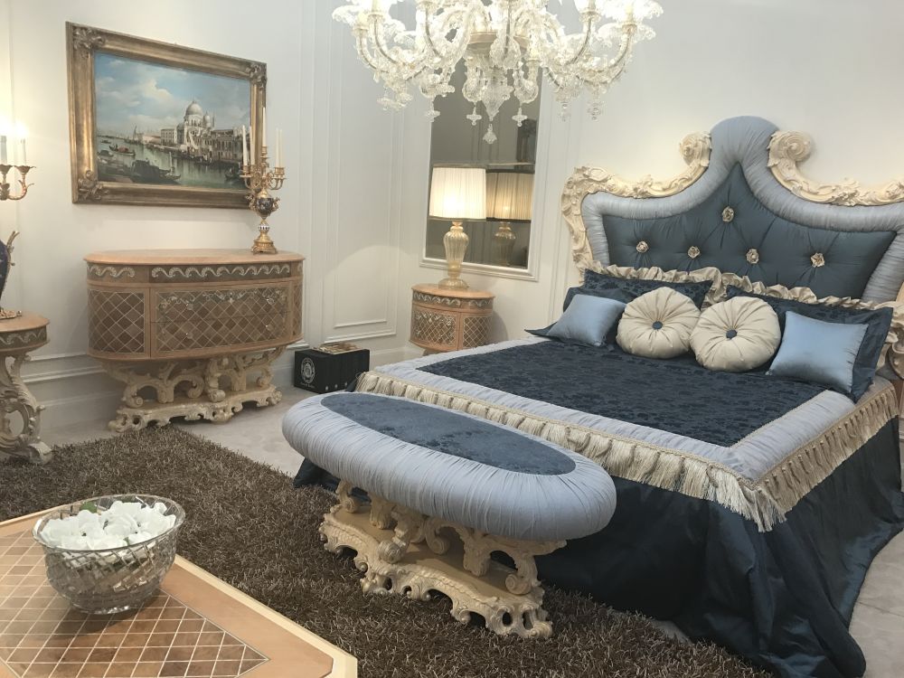 Rococo style bedroom in blue with bench and dressing table