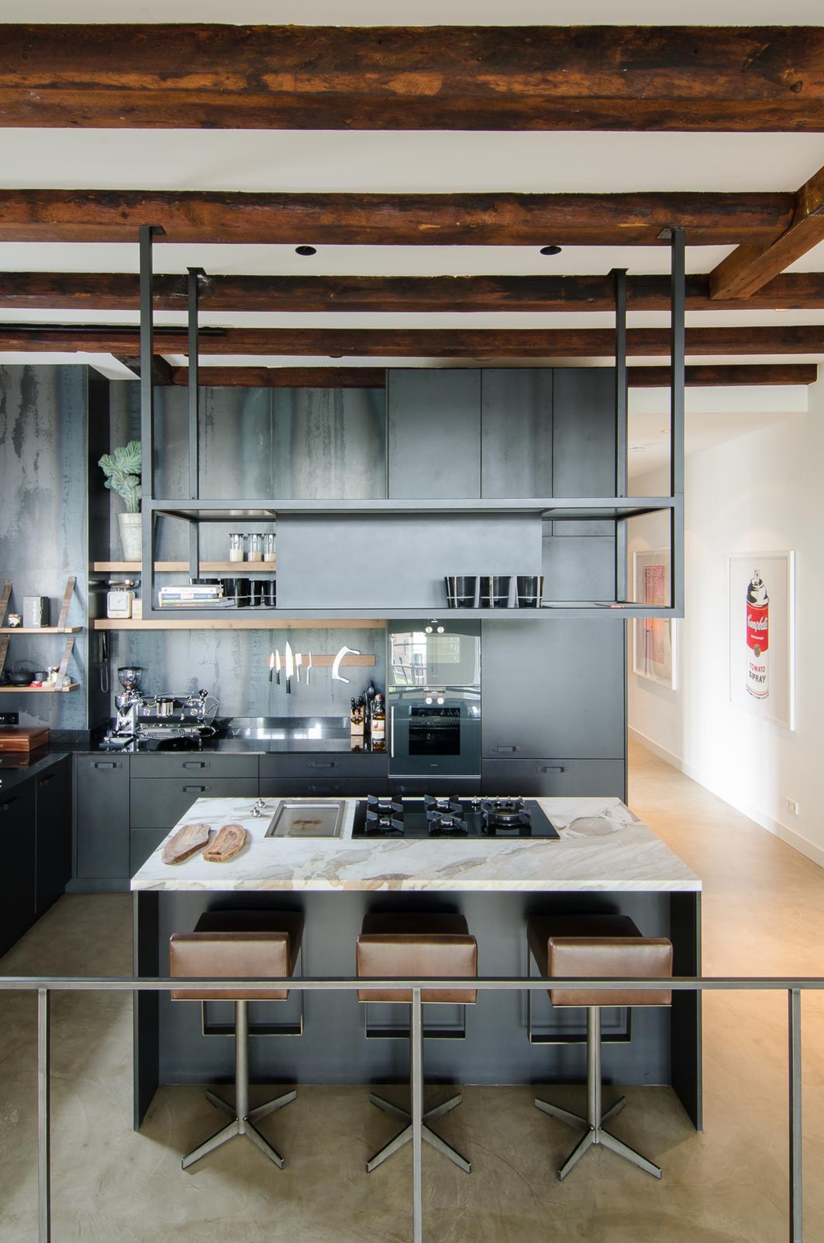 Black kitchen marble island wooden beams