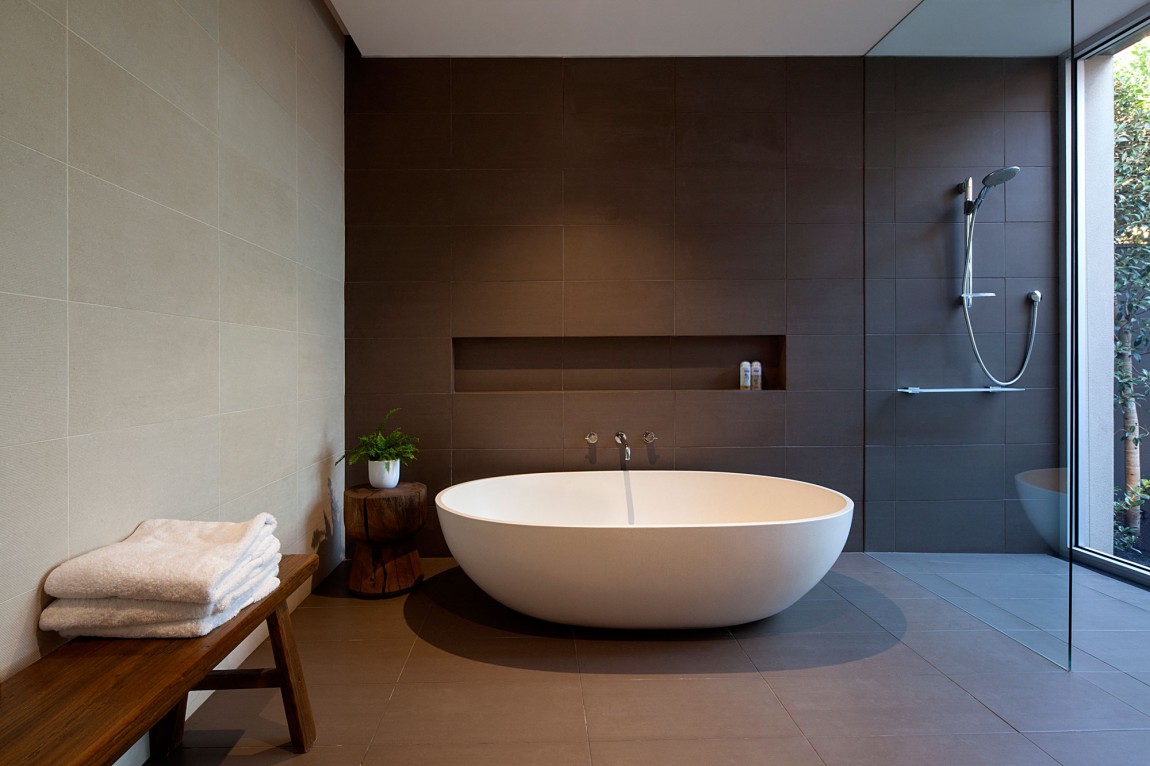 Contemporary grey shower design with large glass