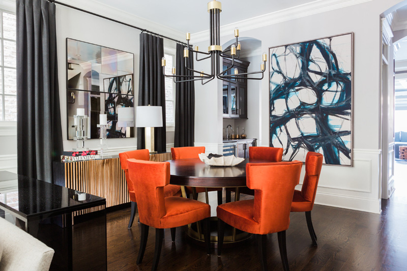 Orange dining chairs and black chandelier - abstract wall art