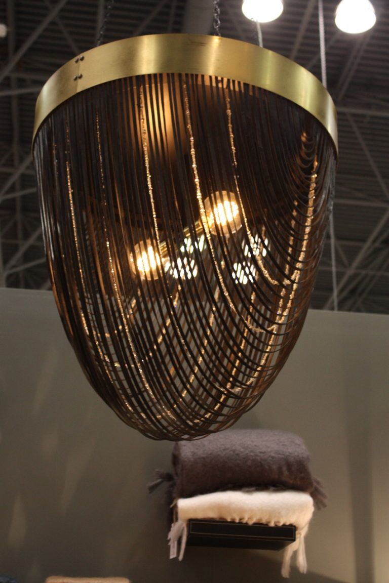 The judicious use of bling makes for a glamorous yet versatile light fixture.