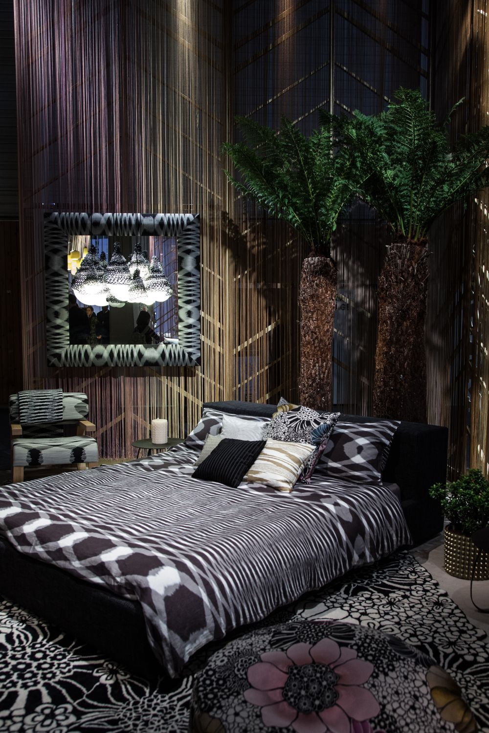 An eclectic bedroom decor can be characterized by an abundance of different prints and patterns