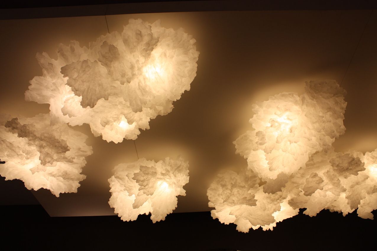 Cloud-like formations from Maison Gerard cover a ceiling and add plenty of drama.