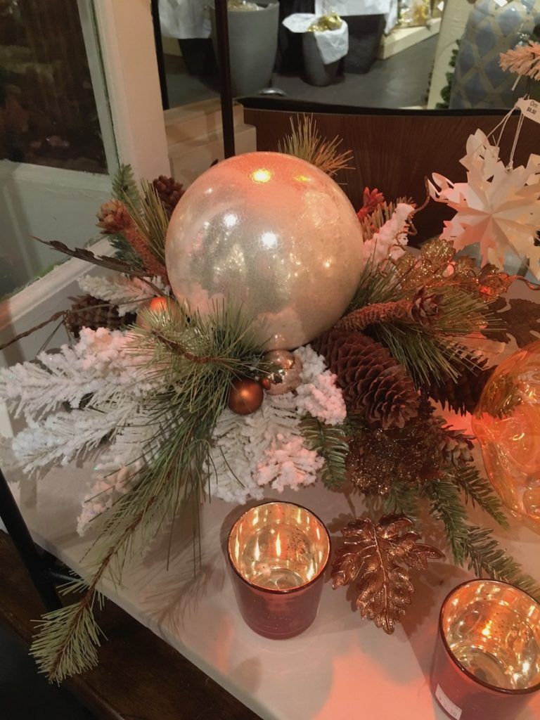 An unexpected or unusual dominant element makes a holiday centerpiece more contemporary.