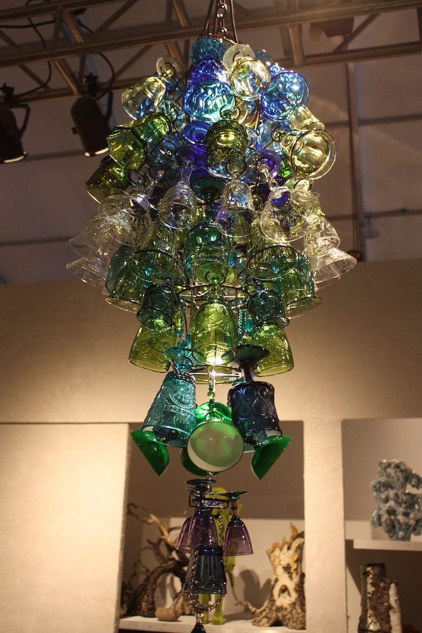 The predominantly green and blue fixture is accented with piece in an eggplant shade.