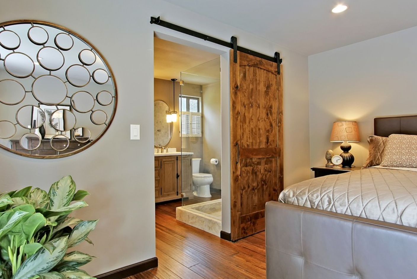 Bedroom with bathroom barn door