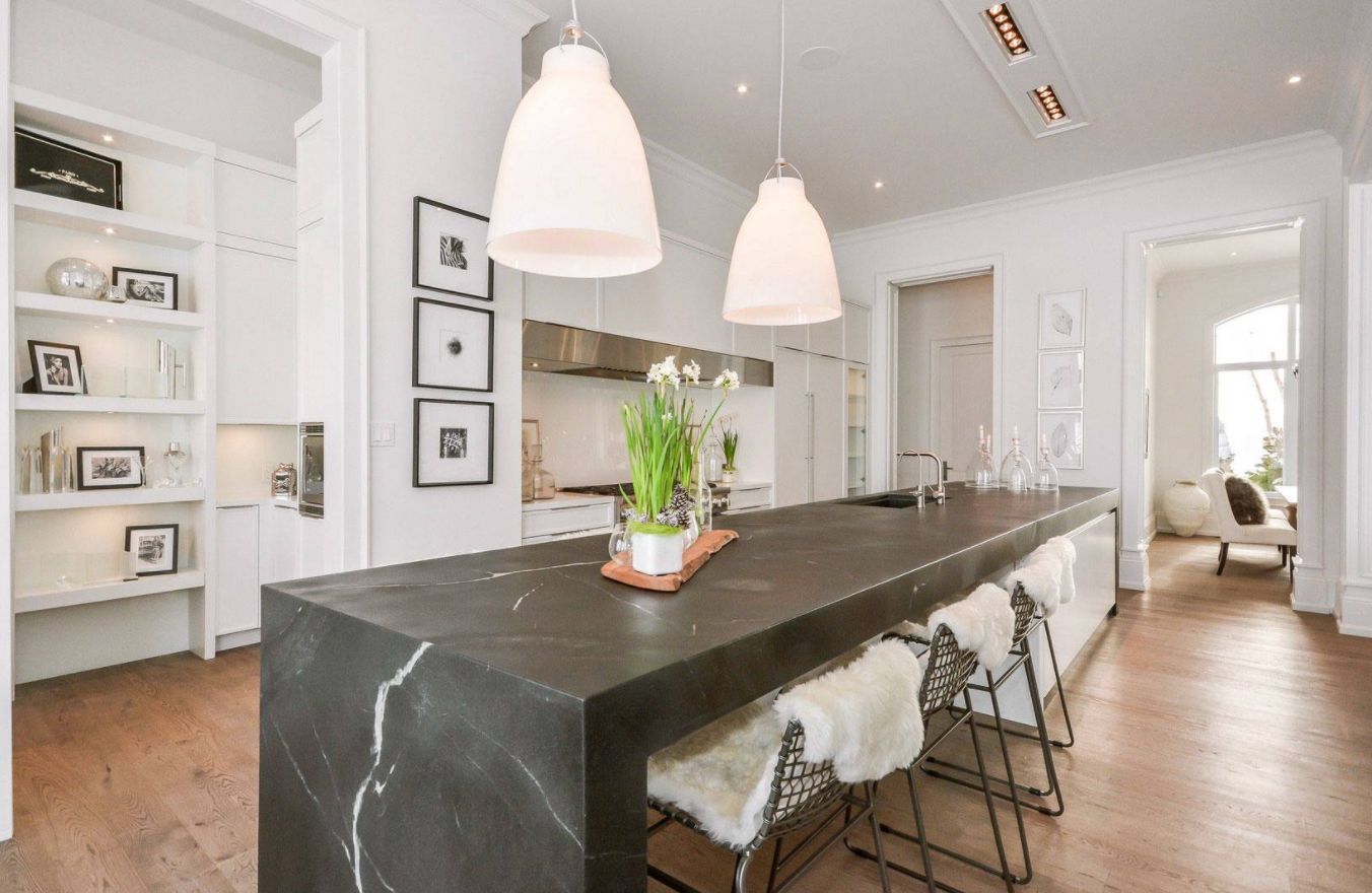 Waterfall Countertop Trend Flows Into US Kitchens   Open Space Kitchen With Black Marble Waterfall Island 