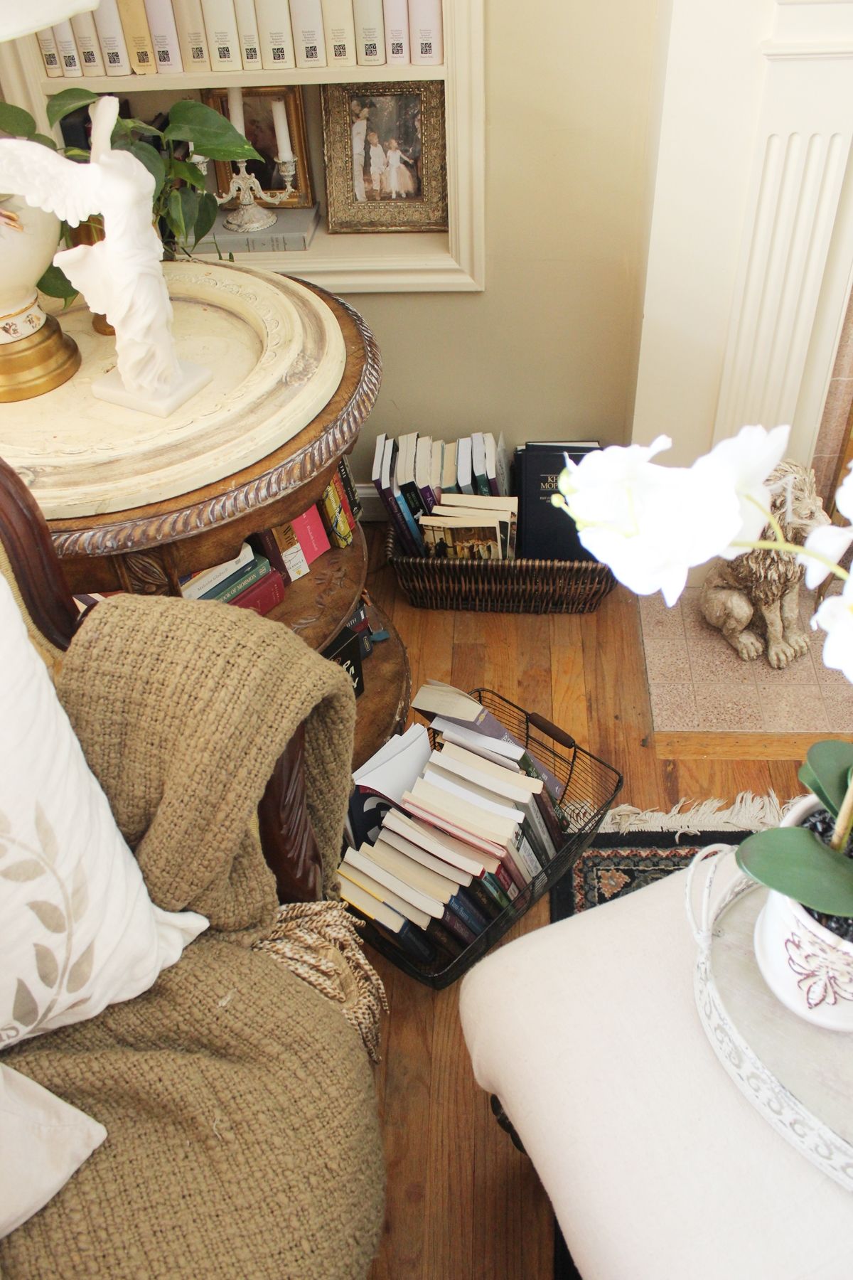 How to Decorate a Small Living Room A bench ottoman is upholstered and serves multiple purposes