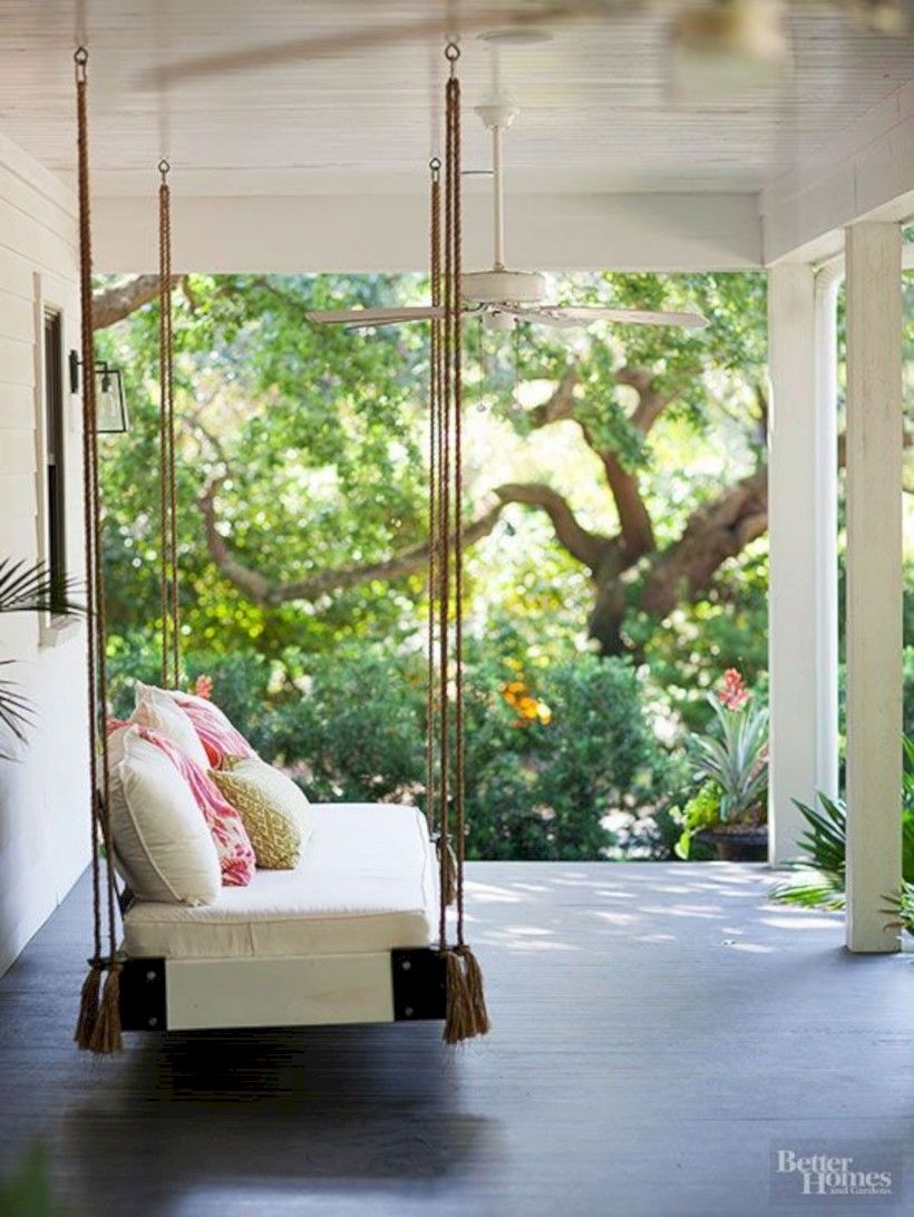 Large porch with hanging chair