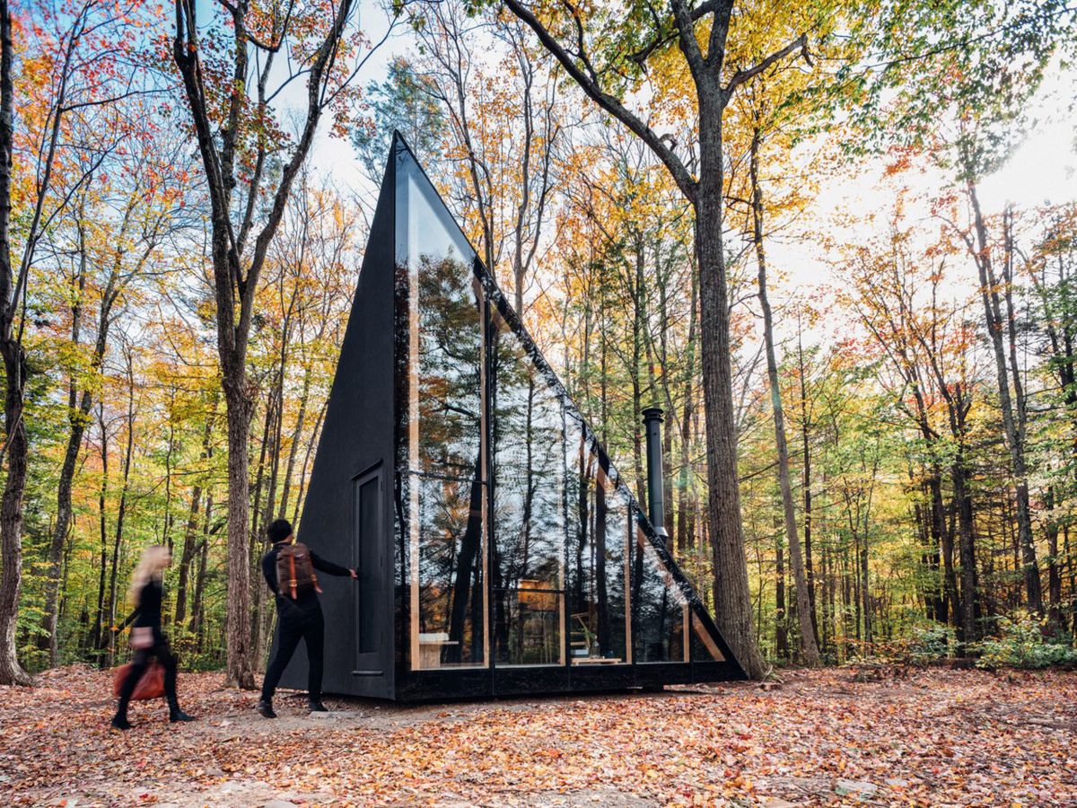 Architecture firm BIG Small Black Cabin A frame