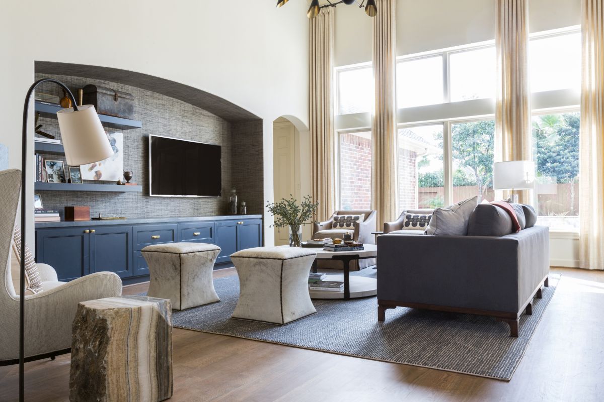 Traditional living room blue tufted ottoman