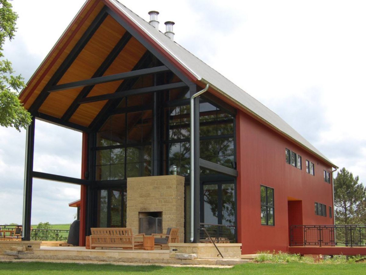 Barn exterior with fireplace on the porch