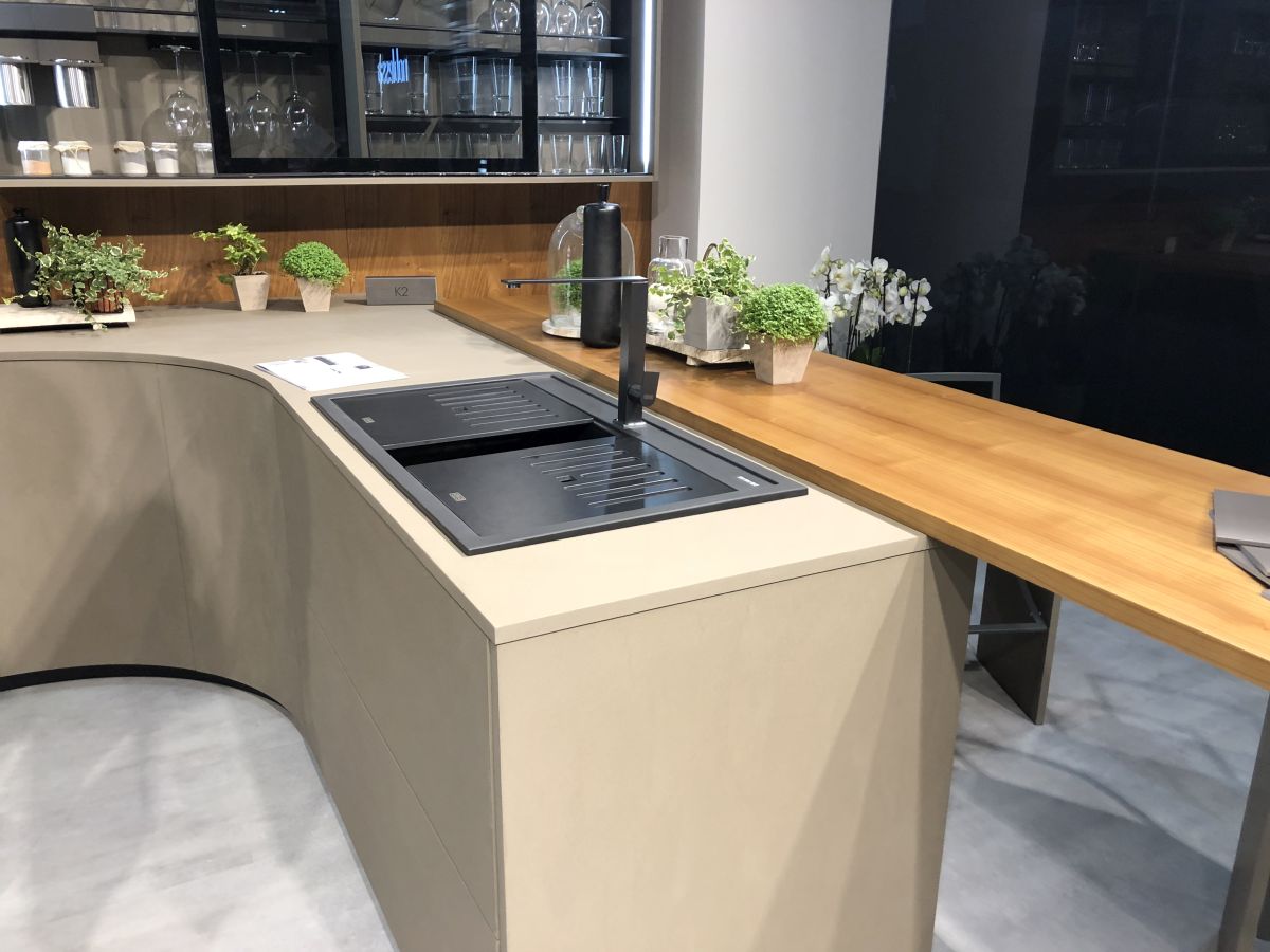 Modern kitchen layout with table extension for breakfast