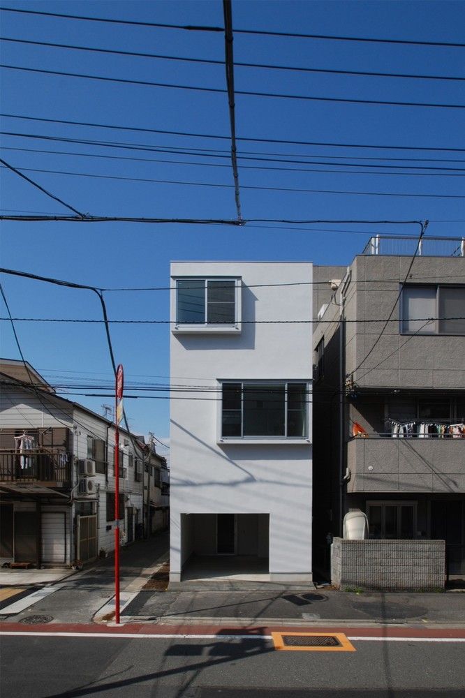 Vietnam narrow house by MM Architects Stairs