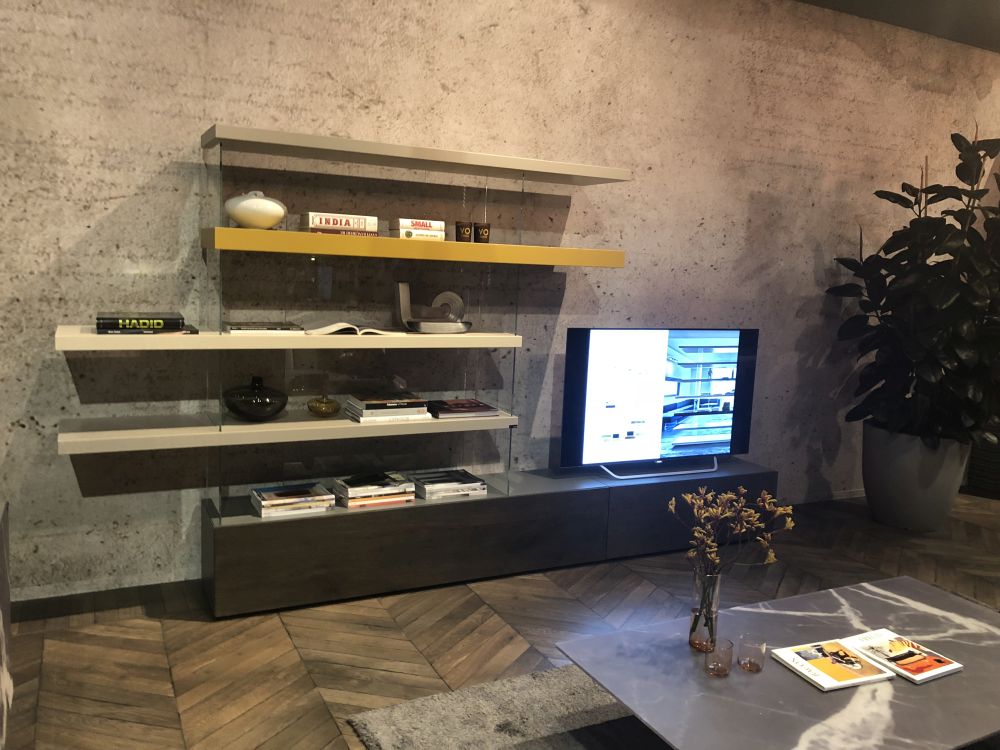 Modern wall unit with floating shelves and glass partition