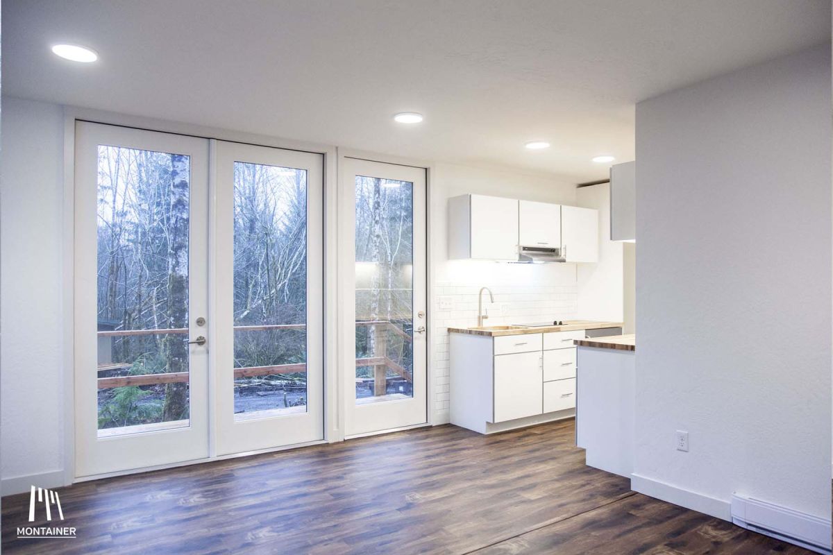 Shipping container cabin in the woods interior 1024x656