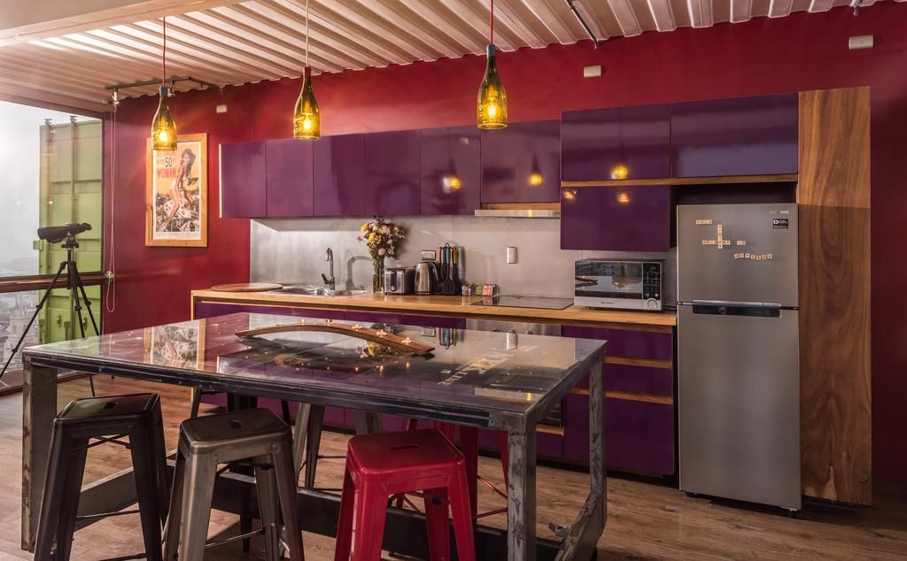 eco-chic shipping container flophouze hotel with small porch