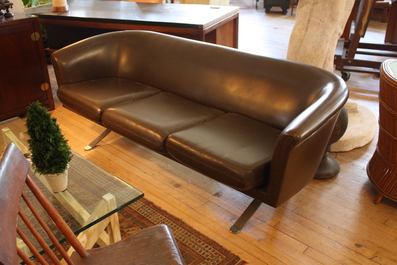 Vintage mid-century modern sofas are hot -- and expensive -- pieces of furniture.